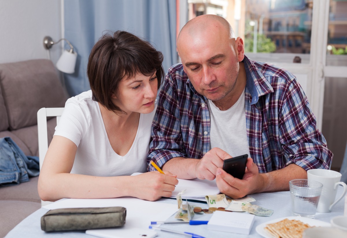 Couple looks over finances 273851976